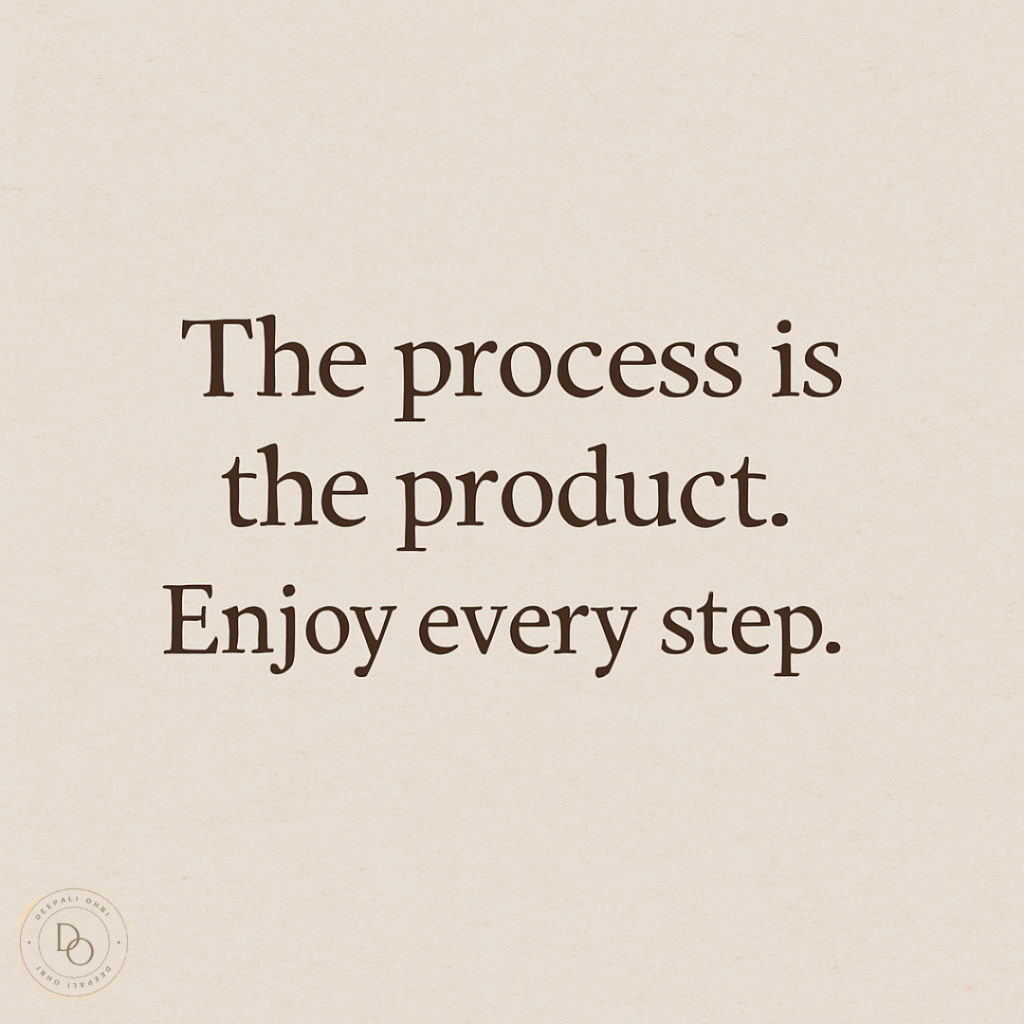 Inspirational quote saying "The process is the product. Enjoy every step." displayed in elegant serif typography on a textured pale cream background.