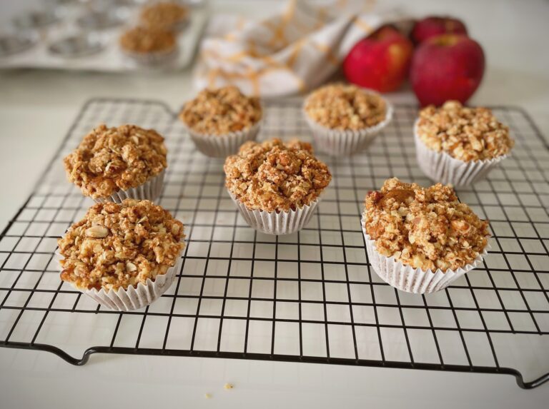 Eggless Apple Crumble Muffins Eggless apple crumble muffins with crunchy streusel topping cooling on a wire rack